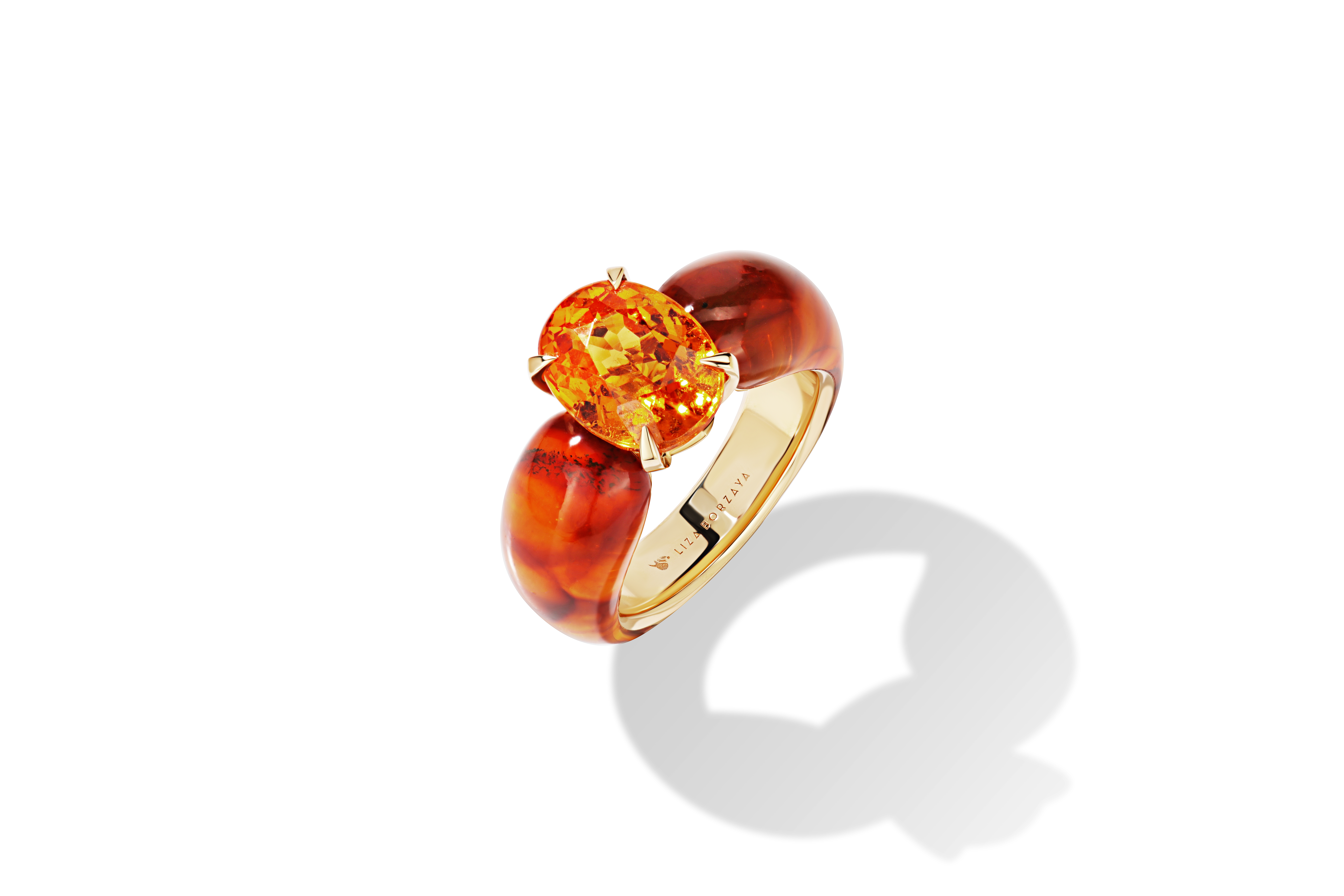 Ring with amber and spessartine